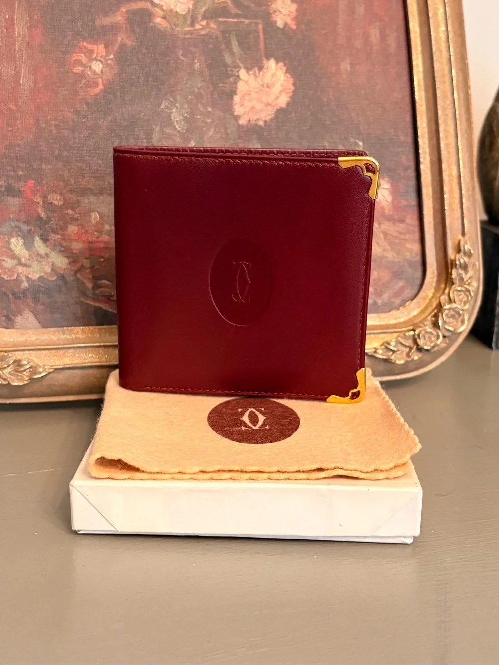 Cartier Burgundy Leather Men's Wallet with Gold Corner Accents